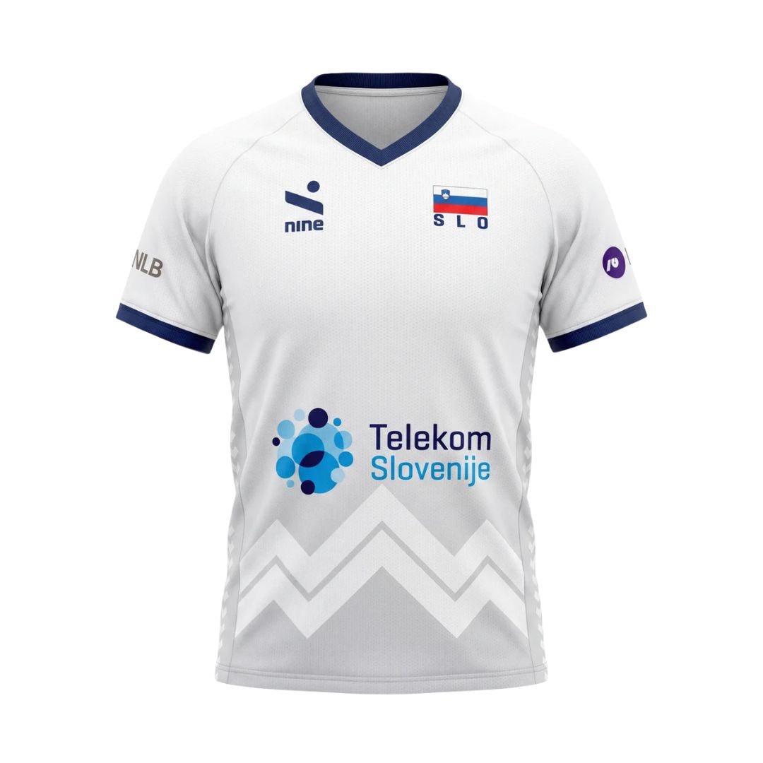 Dres VNL 2026 original, bela odbojkarska majica z modrimi detajli in logotipom Telekom Slovenije.
